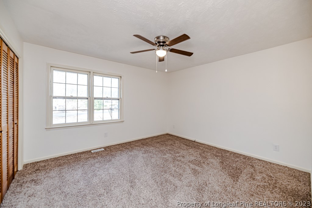 634 Richmond Road Rockingham, NC 28379 - Photo 26 of 40 a view of an empty room with a window