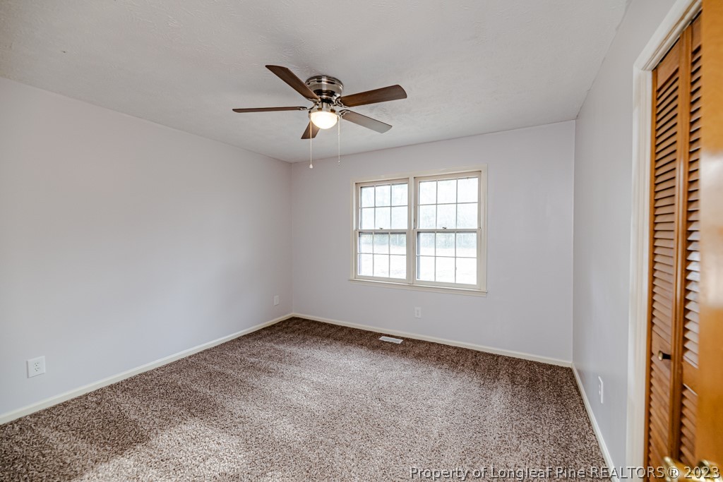 634 Richmond Road Rockingham, NC 28379 - Photo 28 of 40 a view of an empty room with a window