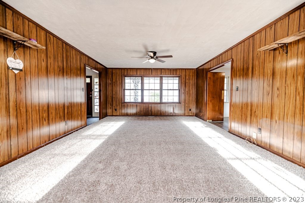 634 Richmond Road Rockingham, NC 28379 - Photo 6 of 40 a view of entryway with wooden floor and windows