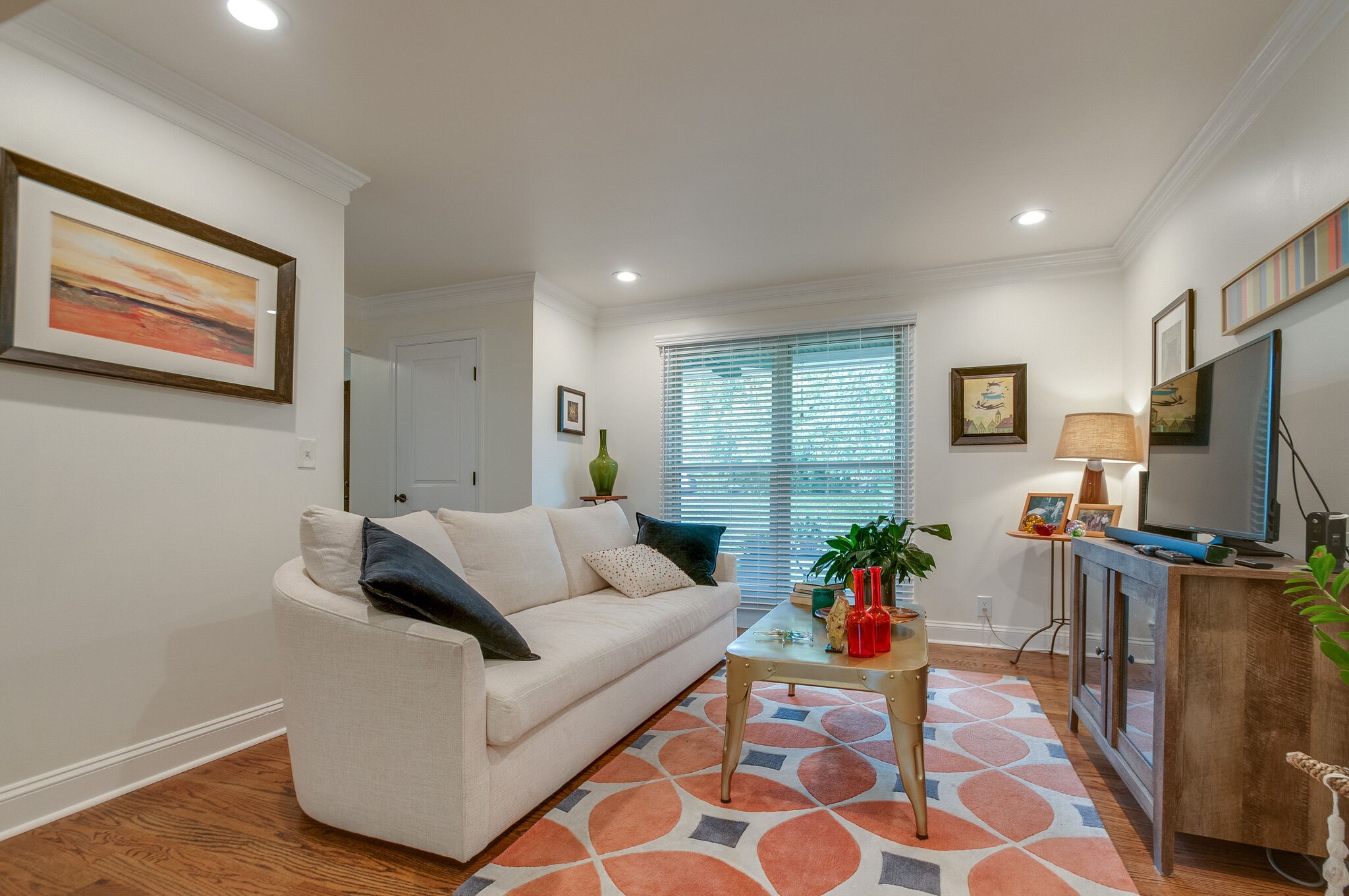 147 Baltusrol Road Franklin, TN 37069 - Photo 11 of 41 a living room with furniture and a flat screen tv