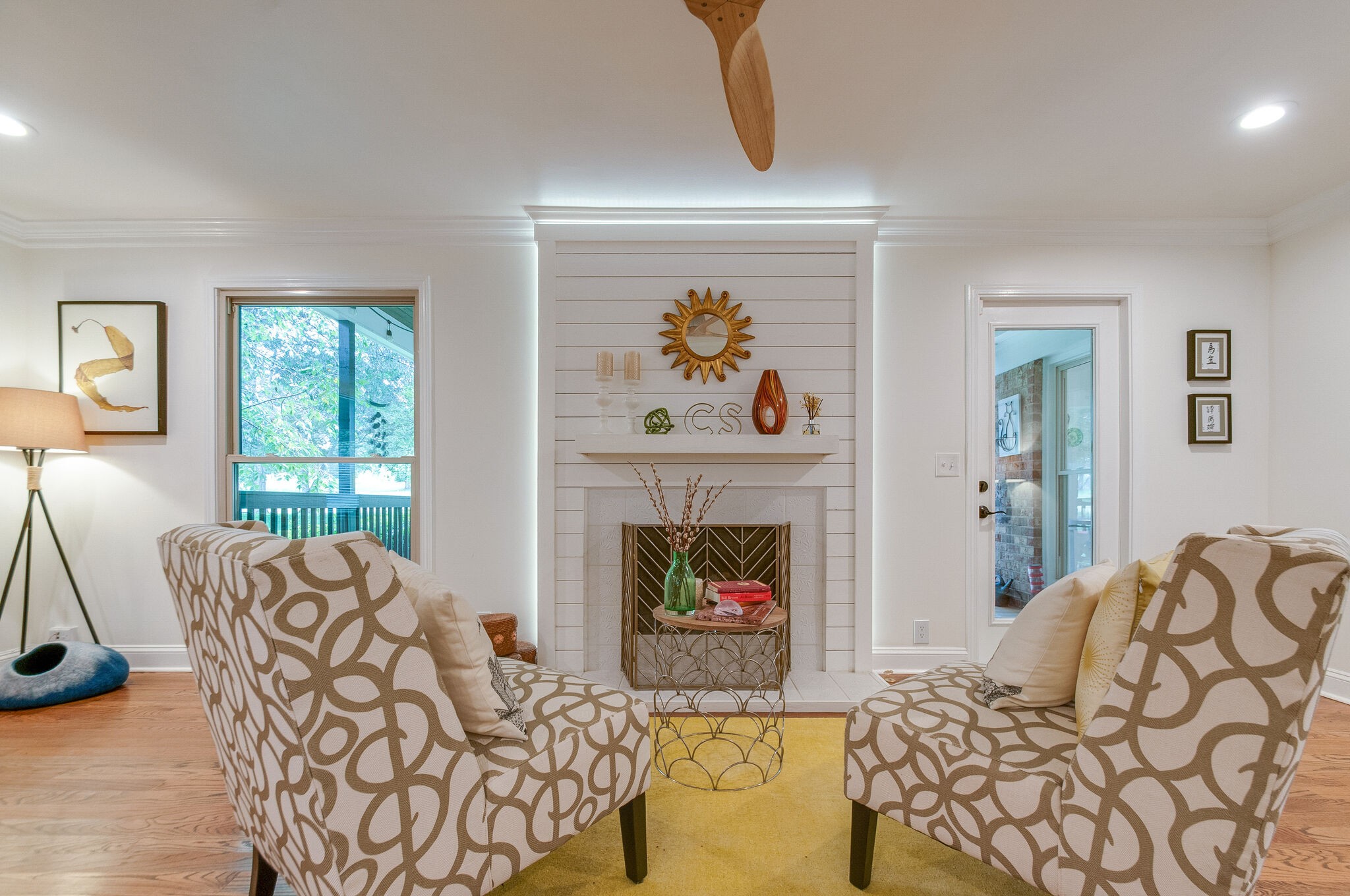 147 Baltusrol Road Franklin, TN 37069 - Photo 15 of 41 a living room with furniture a fireplace and a flat screen tv