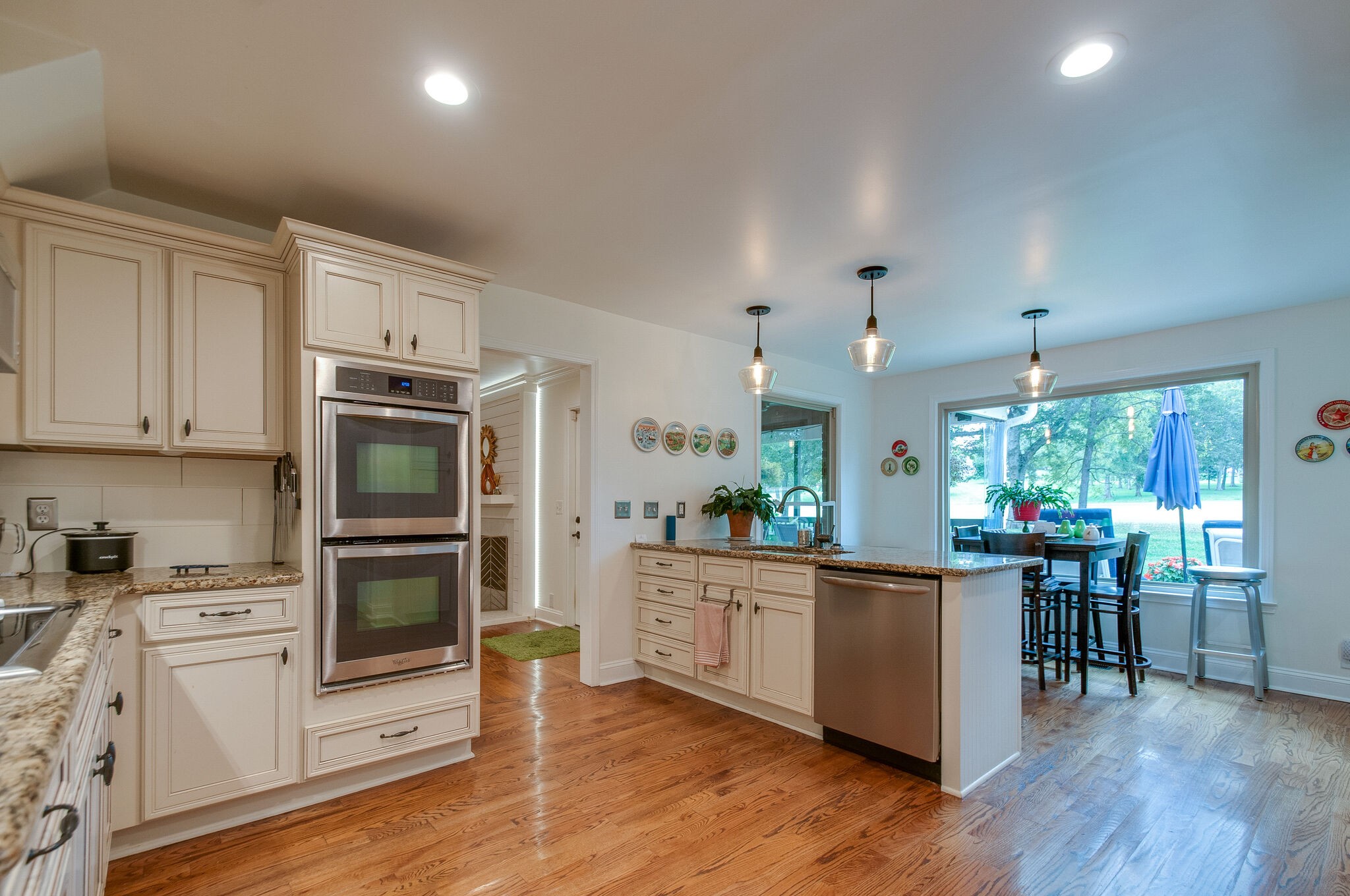 147 Baltusrol Road Franklin, TN 37069 - Photo 20 of 41 a kitchen with a sink cabinets and wooden floor