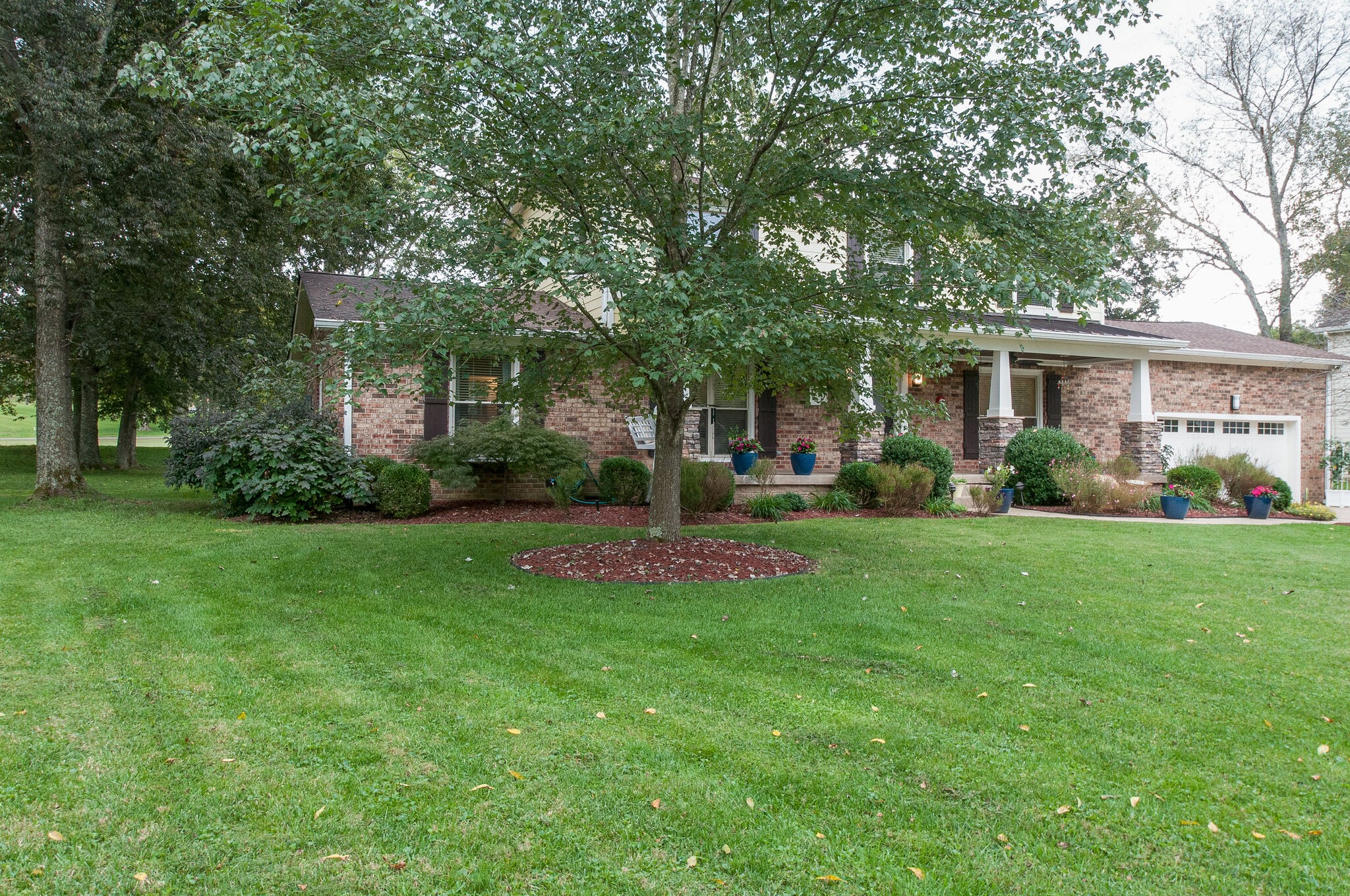 147 Baltusrol Road Franklin, TN 37069 - Photo 2 of 41 a view of a house with backyard and garden