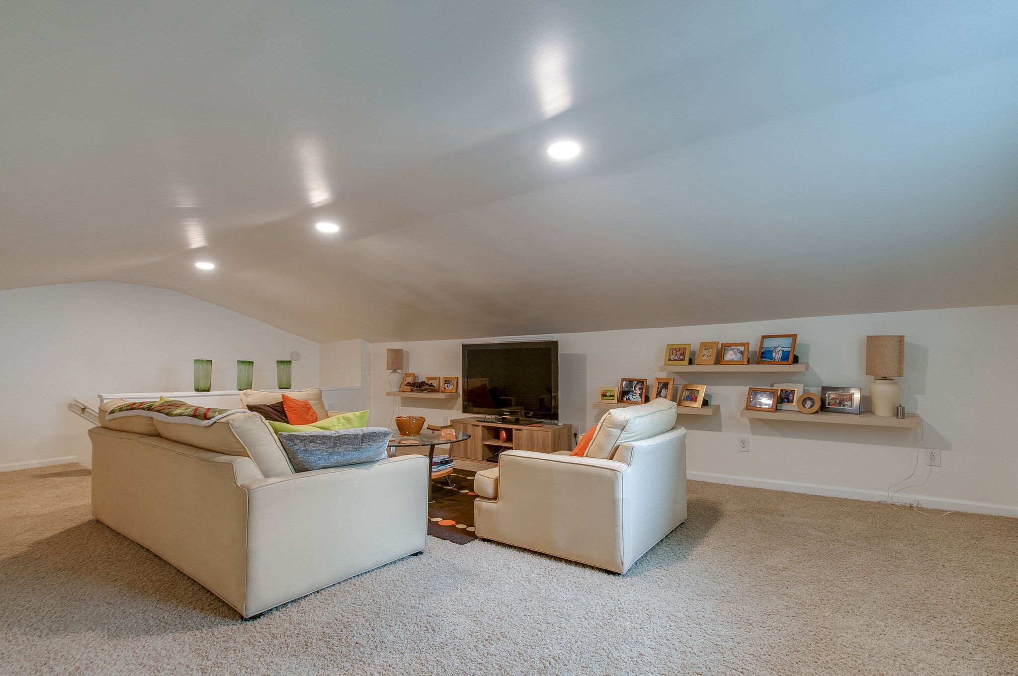 147 Baltusrol Road Franklin, TN 37069 - Photo 26 of 41 a living room with furniture and a flat screen tv