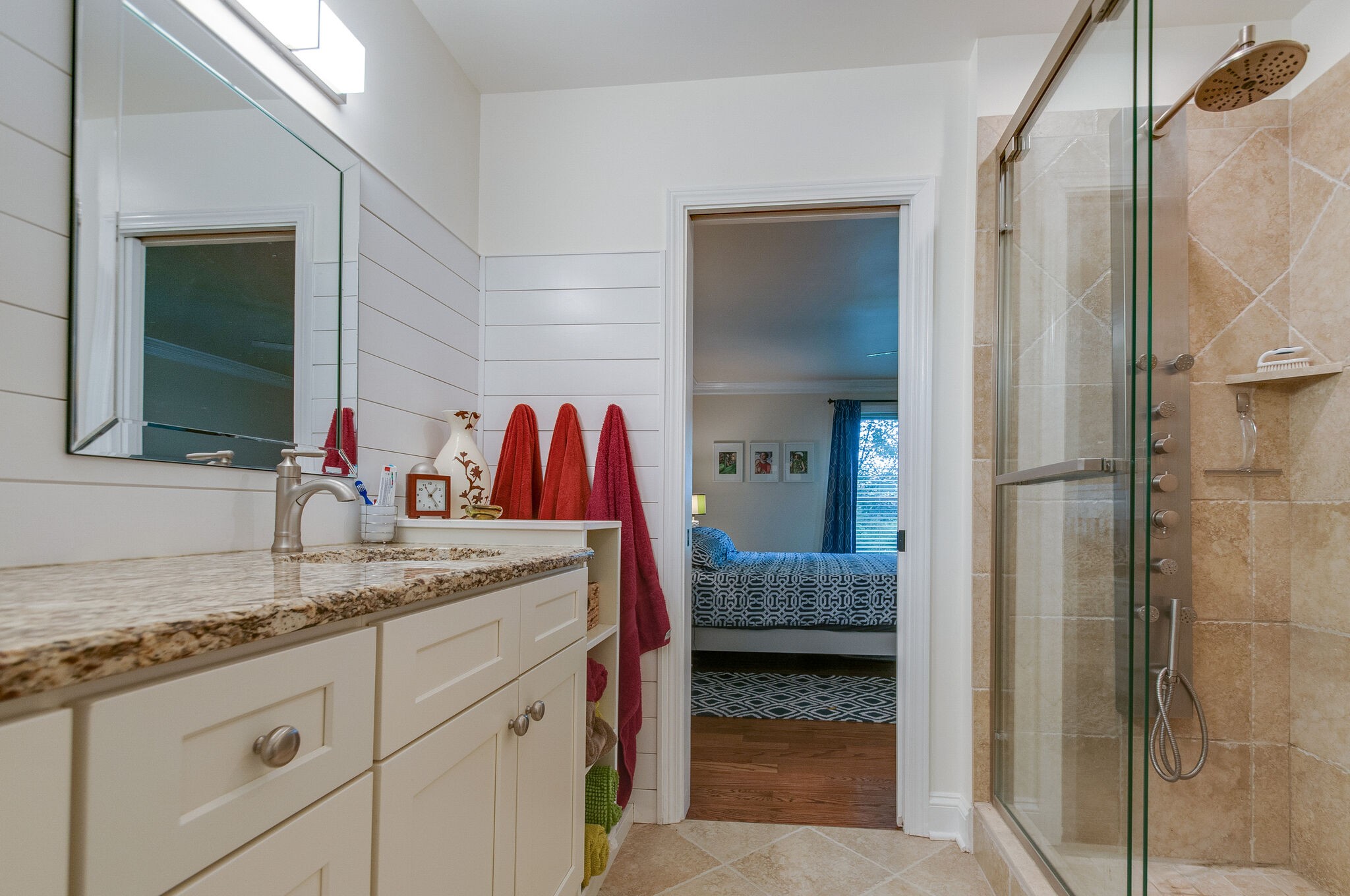 147 Baltusrol Road Franklin, TN 37069 - Photo 30 of 41 a en suite bathroom with a granite countertop sink and a mirror