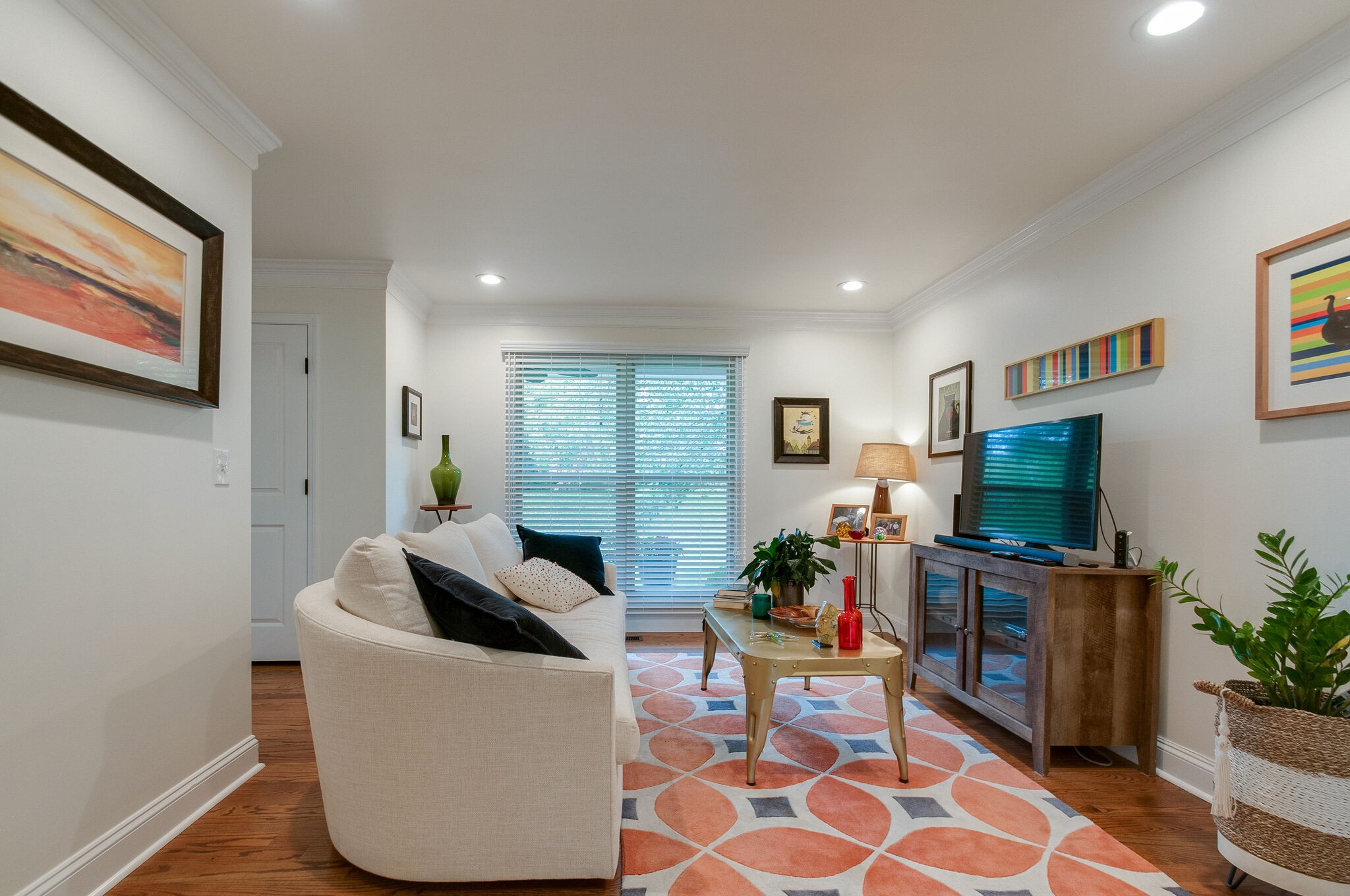 147 Baltusrol Road Franklin, TN 37069 - Photo 10 of 41 a living room with furniture and a flat screen tv