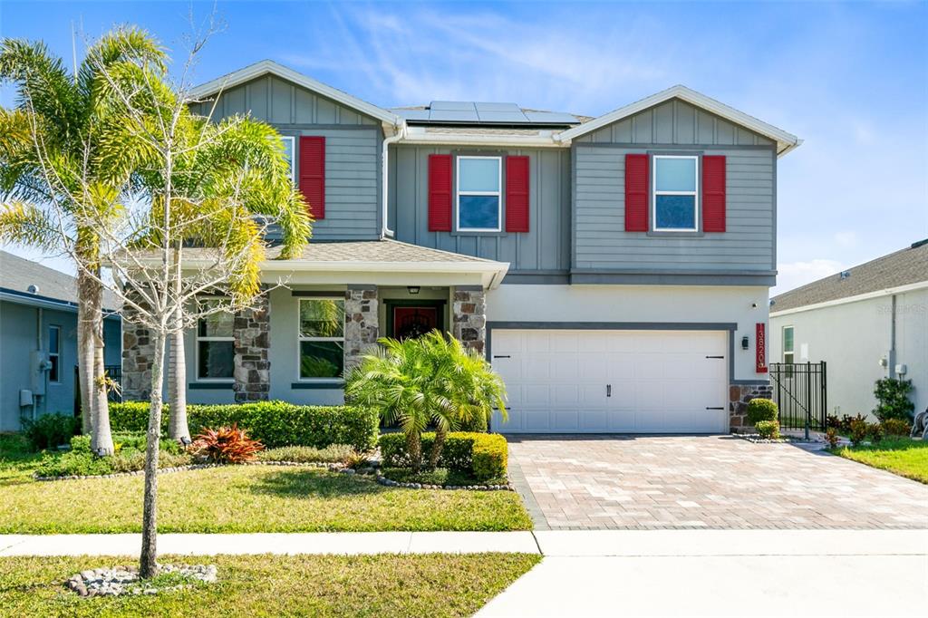 13820 Rushing Creek Run Orlando, FL 32824 - Photo 1 of 1 a front view of a house with a yard and garage