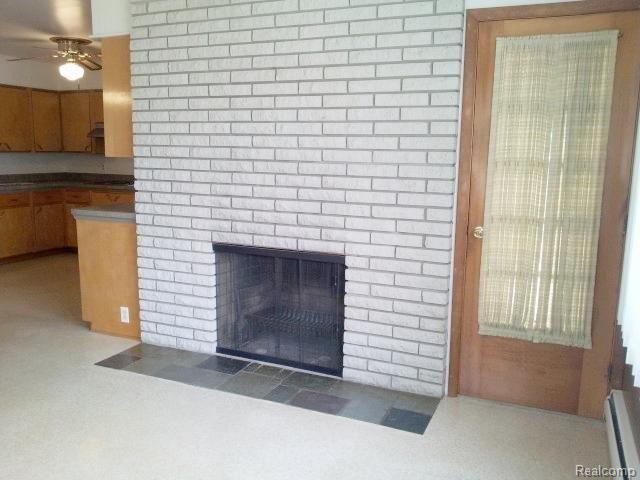8626 32 Mile Road Washington, MI 48095 - Photo 6 of 25 8626 32 Mile #6 fireplace.jpg