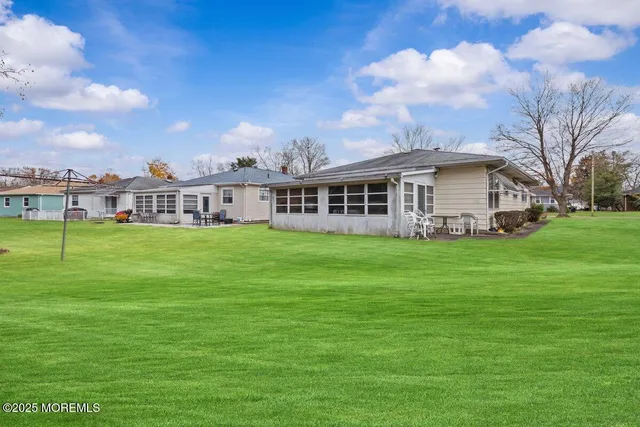 a view of a house with a big yard