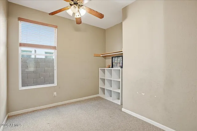 a view of a hallway with closet and entryway