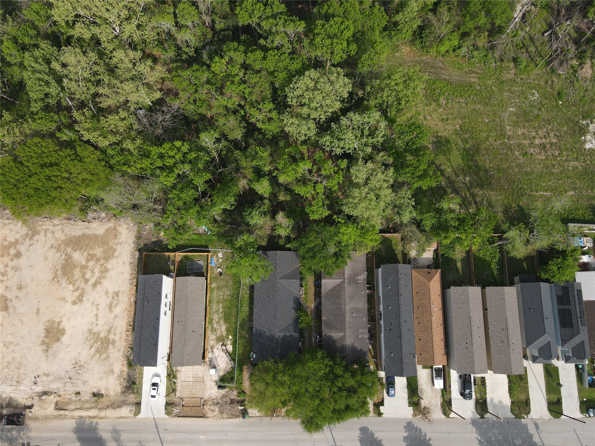 7800 Sand Street Houston, TX 77088 - Photo 2 of 4 a view of a backyard with wooden fence