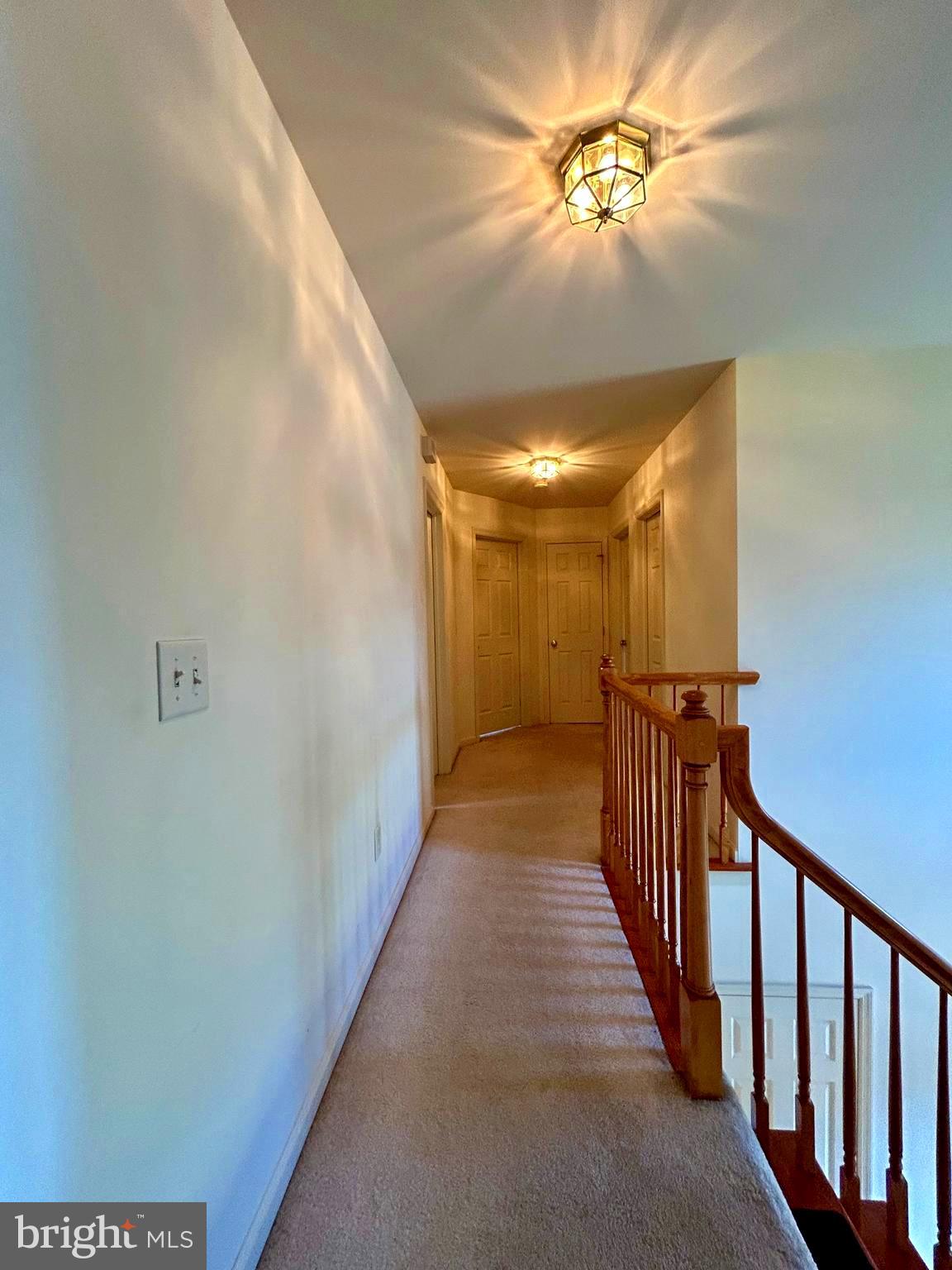 214 Pumping Station Road Quarryville, PA 17566 - Photo 28 of 46 a view of a hallway with a chandelier fan
