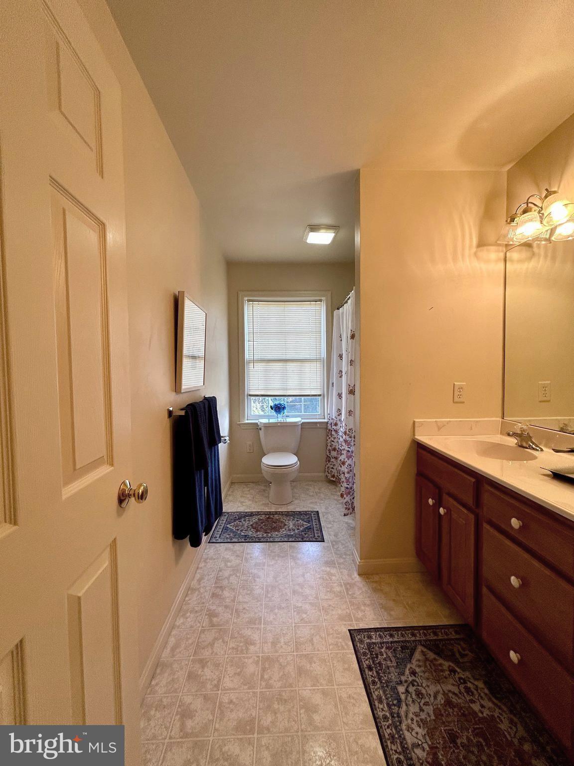 214 Pumping Station Road Quarryville, PA 17566 - Photo 36 of 46 a spacious bathroom with a tub and mirror