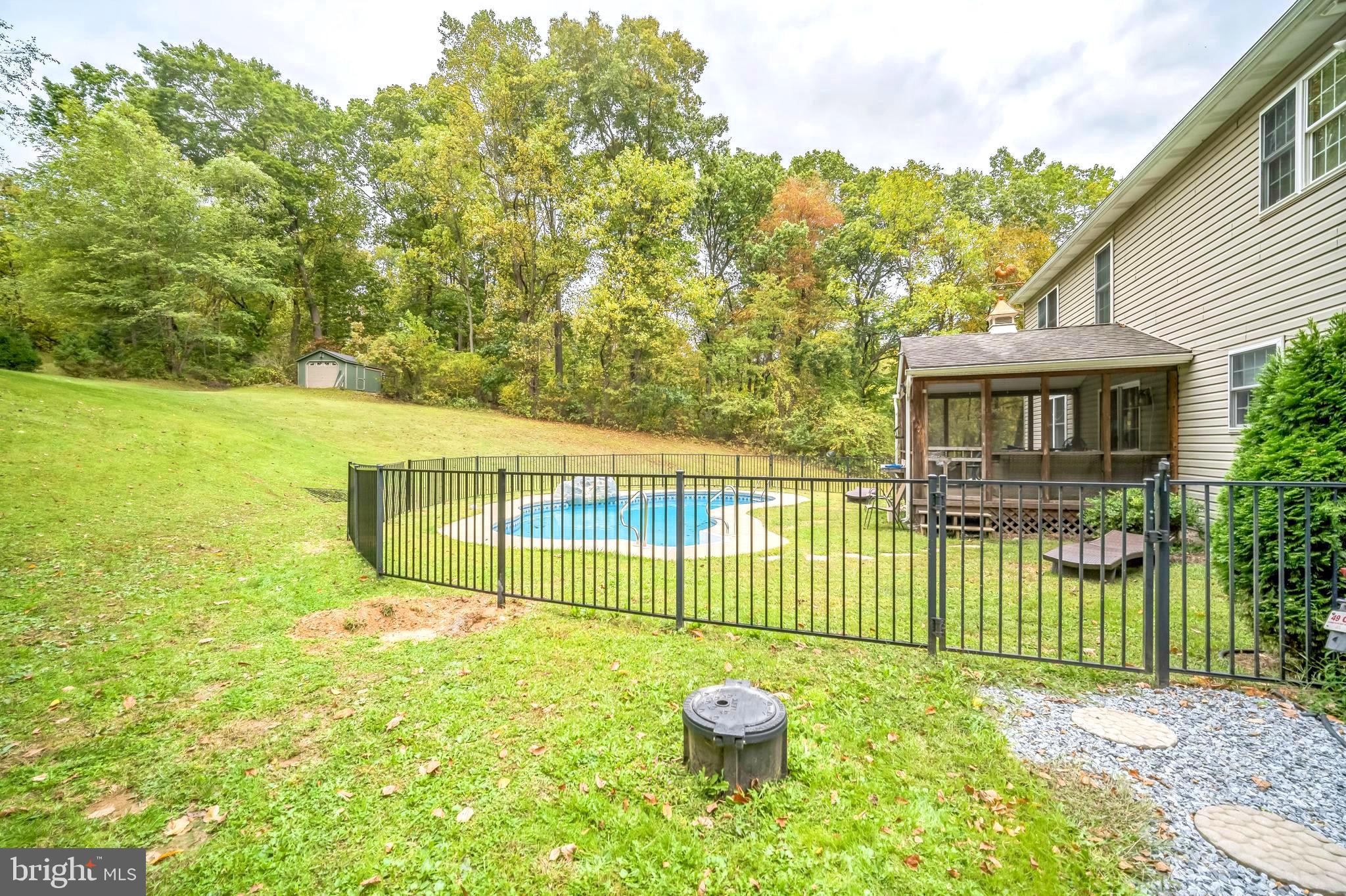 214 Pumping Station Road Quarryville, PA 17566 - Photo 41 of 46 a view of a house with a backyard and a garden