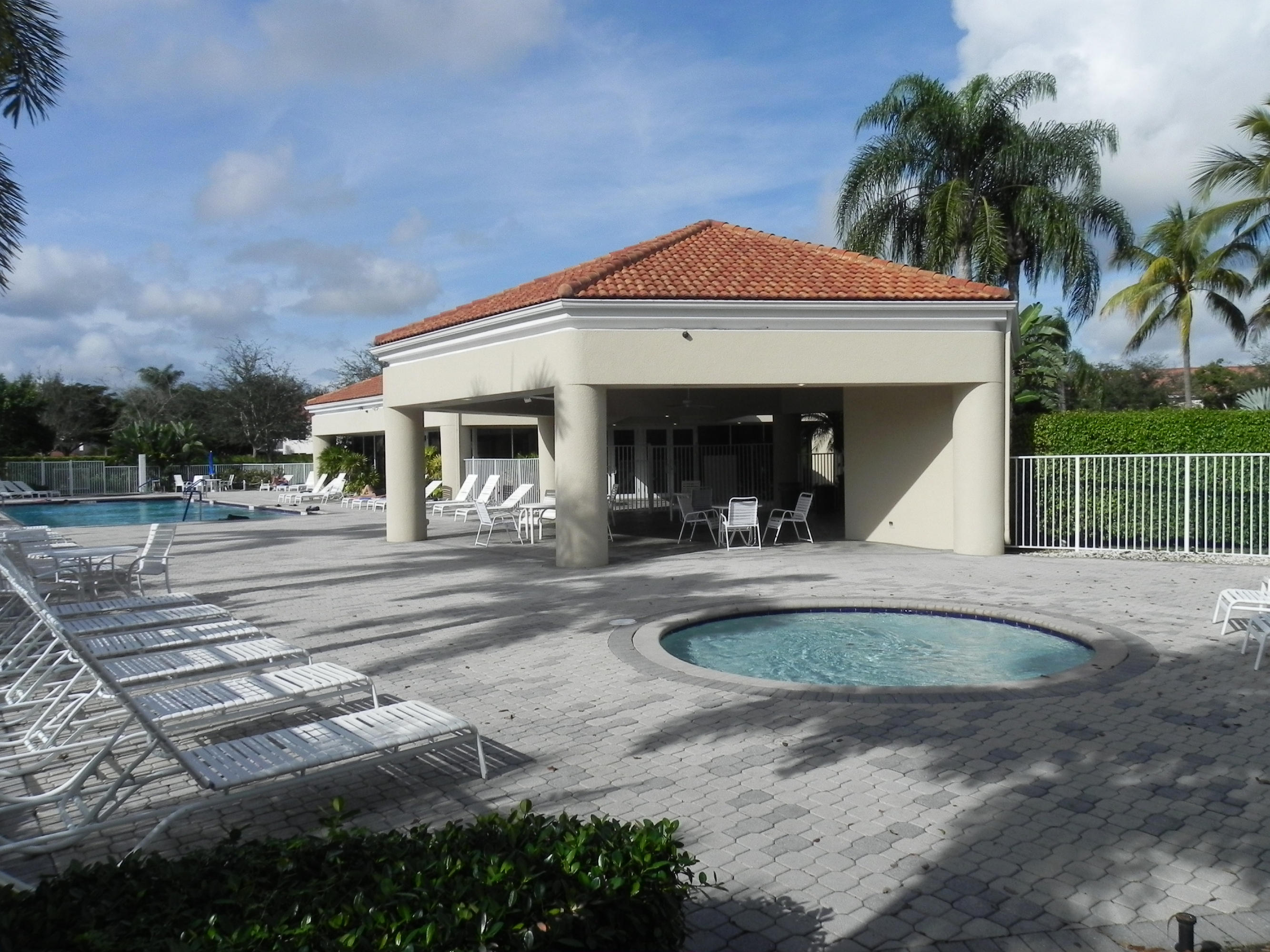 8609 Vía Giula Boca Raton, FL 33496 - Photo 33 of 40 Community Pool, Spa & Clubhouse