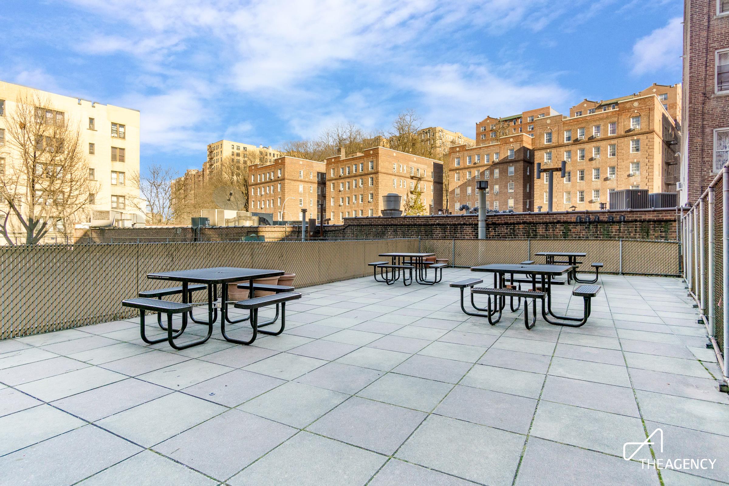 153 Bennett Avenue, Unit 3G Manhattan, NY 10040 - Photo 11 of 14 a view of a terrace with chairs and a table