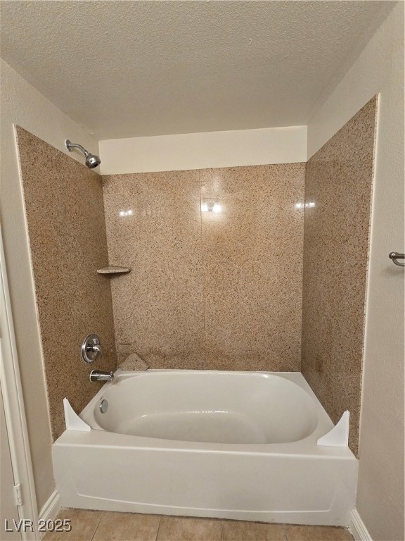 8000 West Badura Avenue, Unit 2135 Las Vegas, NV 89113 - Photo 21 of 28 Bathroom with a textured ceiling, shower / washtub combination, and tile patterned flooring