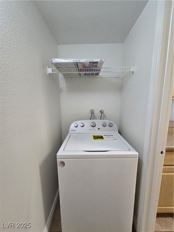 8000 West Badura Avenue, Unit 2135 Las Vegas, NV 89113 - Photo 25 of 28 Laundry room with washer / clothes dryer and baseboards
