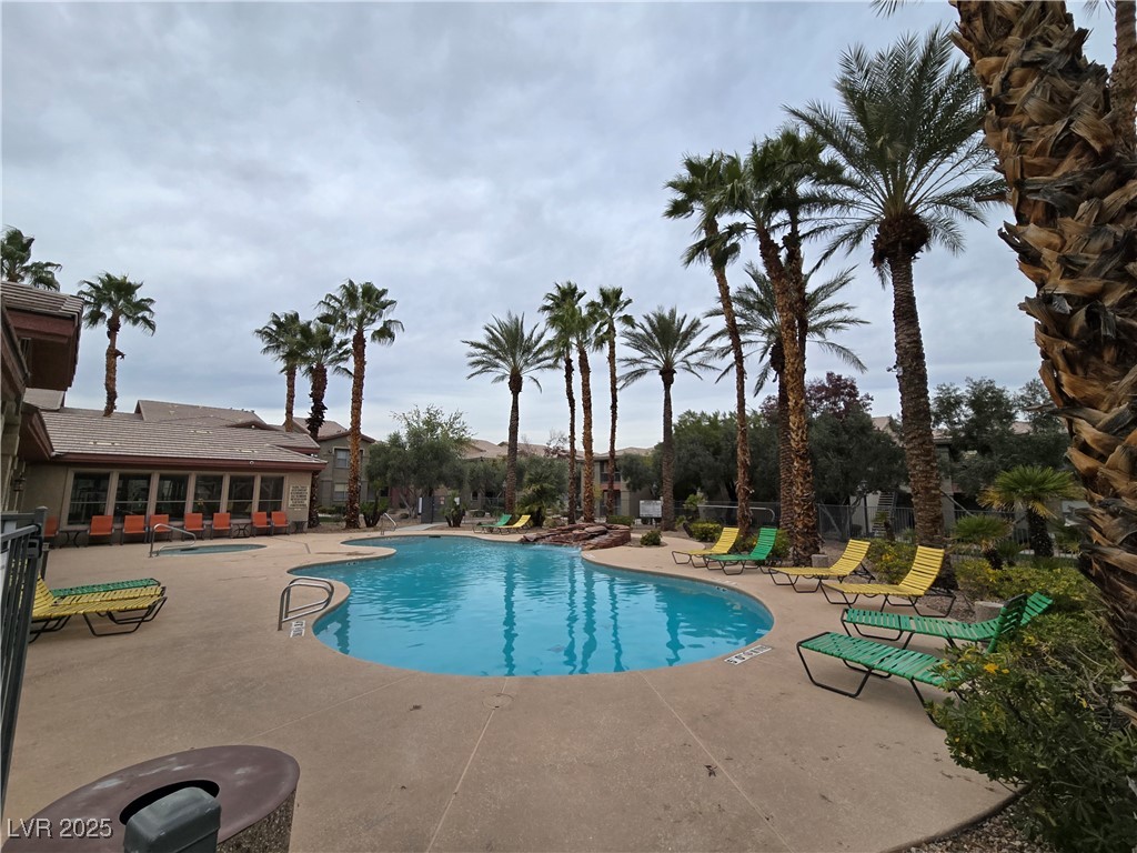 8000 West Badura Avenue, Unit 2135 Las Vegas, NV 89113 - Photo 28 of 28 Community pool with a patio area