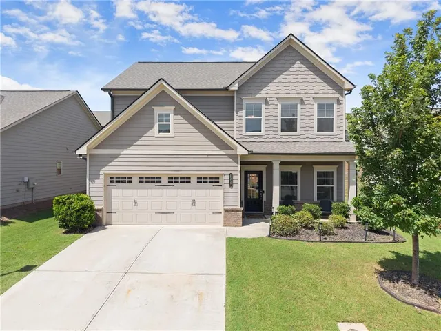 a view of a house with garden