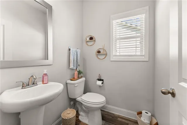 a spacious bedroom with a bed and a window