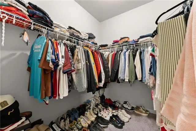 a bathroom with a sink double vanity and a mirror
