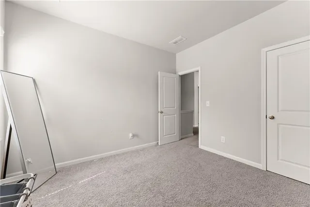 a view of a back yard of the house