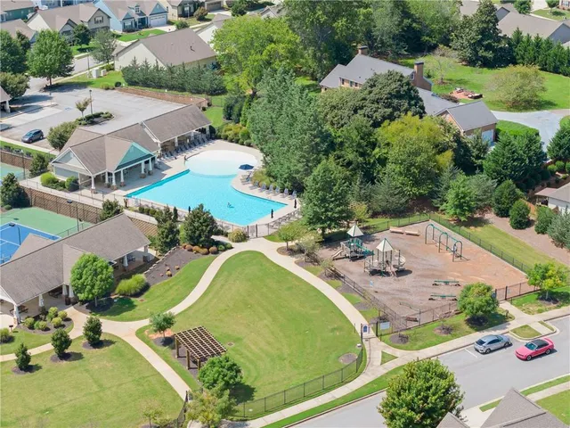 an aerial view of a house with a garden