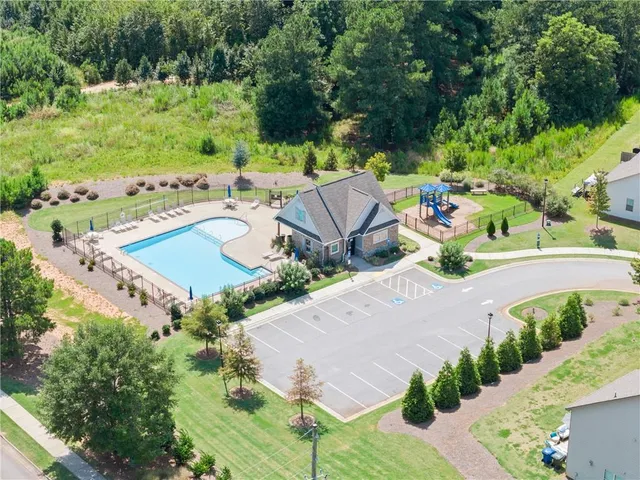 an aerial view of a house with a garden