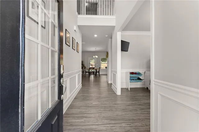 a room with furniture and wooden floor