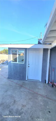 a bathroom with a shower and toilet