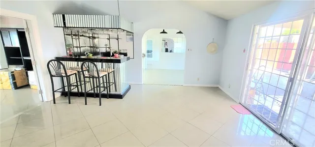 a bathroom with a sink a toilet and a window