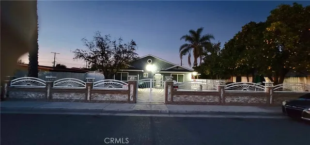 a view of multiple houses with a yard