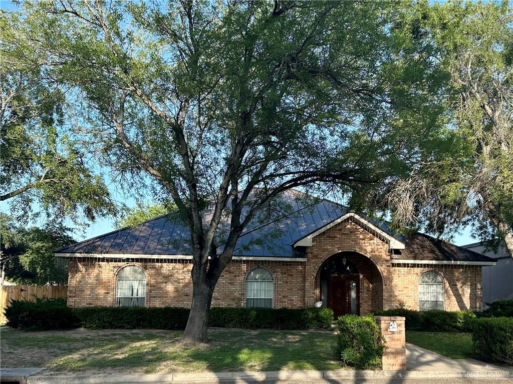 3206 West San Luis Circle Mission, TX 78573 - Photo 1 of 14 a front view of a house with garden