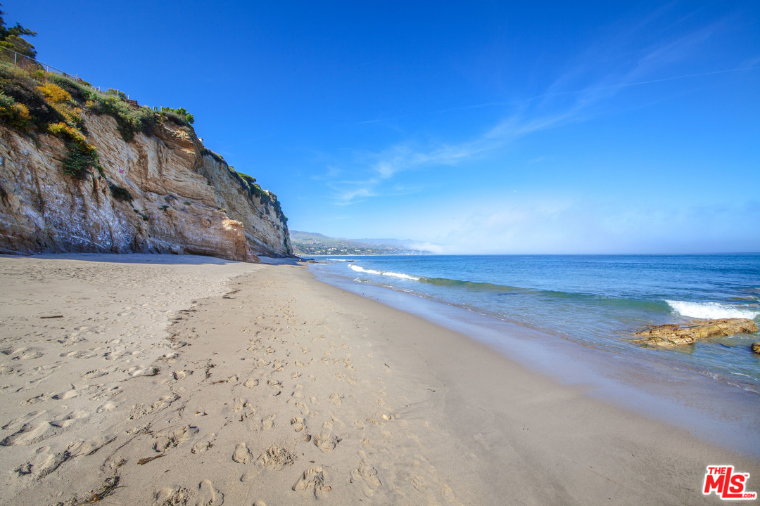 6763 Zumirez Drive Malibu, CA 90265 - Photo 2 of 52 a view of a lake and mountain view