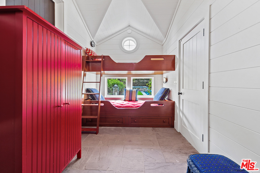 6763 Zumirez Drive Malibu, CA 90265 - Photo 41 of 52 a room with furniture and a large window