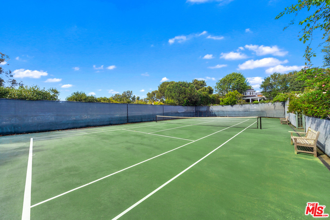 6763 Zumirez Drive Malibu, CA 90265 - Photo 45 of 52 a view of an outdoor space and tennis court