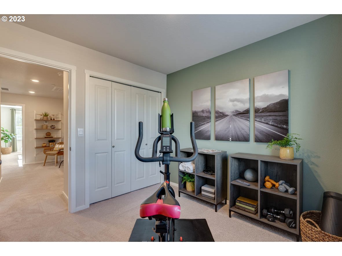 2733 North 2nd Way Ridgefield, WA 98642 - Photo 13 of 24 a room with furniture and a table