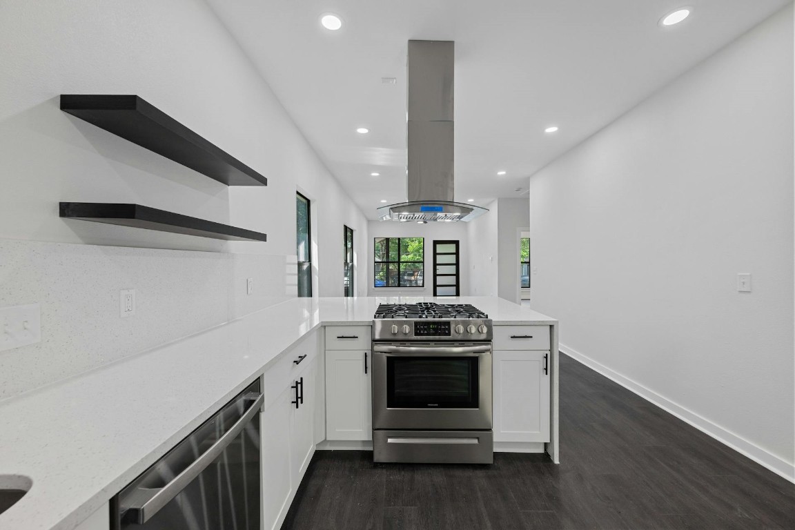 914 East 50th Street Austin, TX 78751 - Photo 13 of 27 Stylish black floating kitchen shelves with view of high ceilings