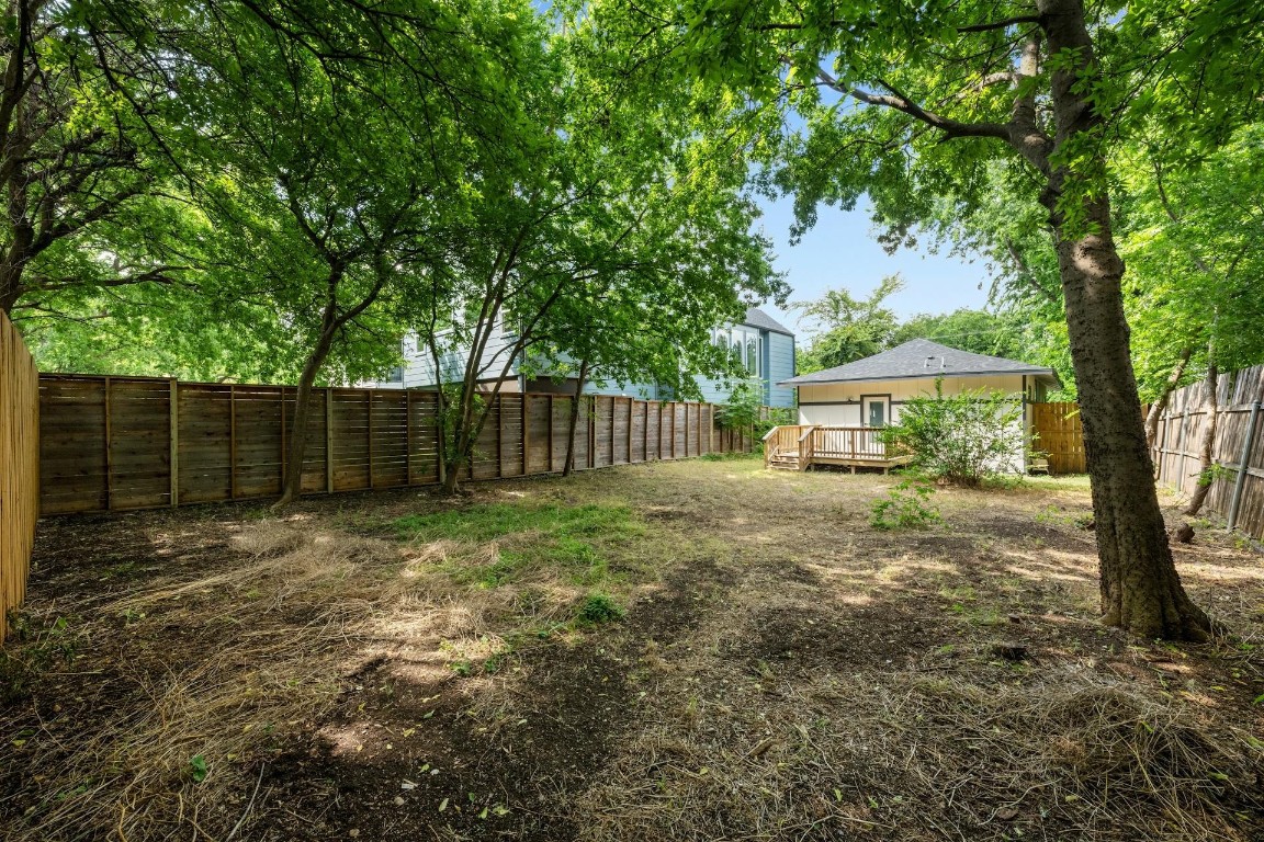 914 East 50th Street Austin, TX 78751 - Photo 24 of 27 Recent privacy fence along back of alley looking toward house
