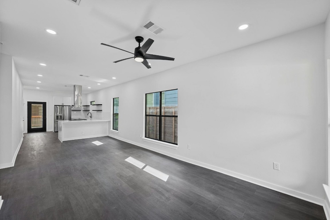 914 East 50th Street Austin, TX 78751 - Photo 4 of 27 Front door view to Back door with kitchen bar area