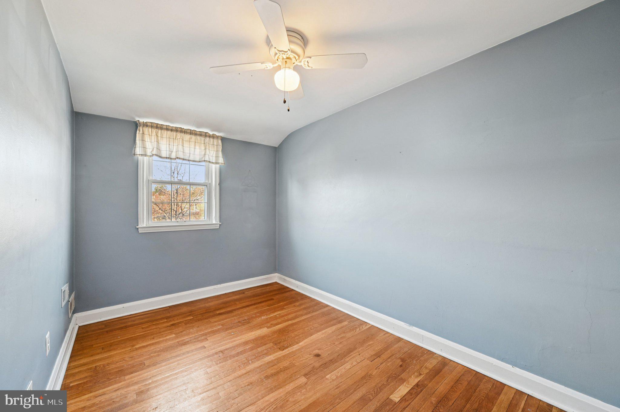 8334 Wyton Road Baltimore, MD 21286 - Photo 21 of 44 an empty room with a window
