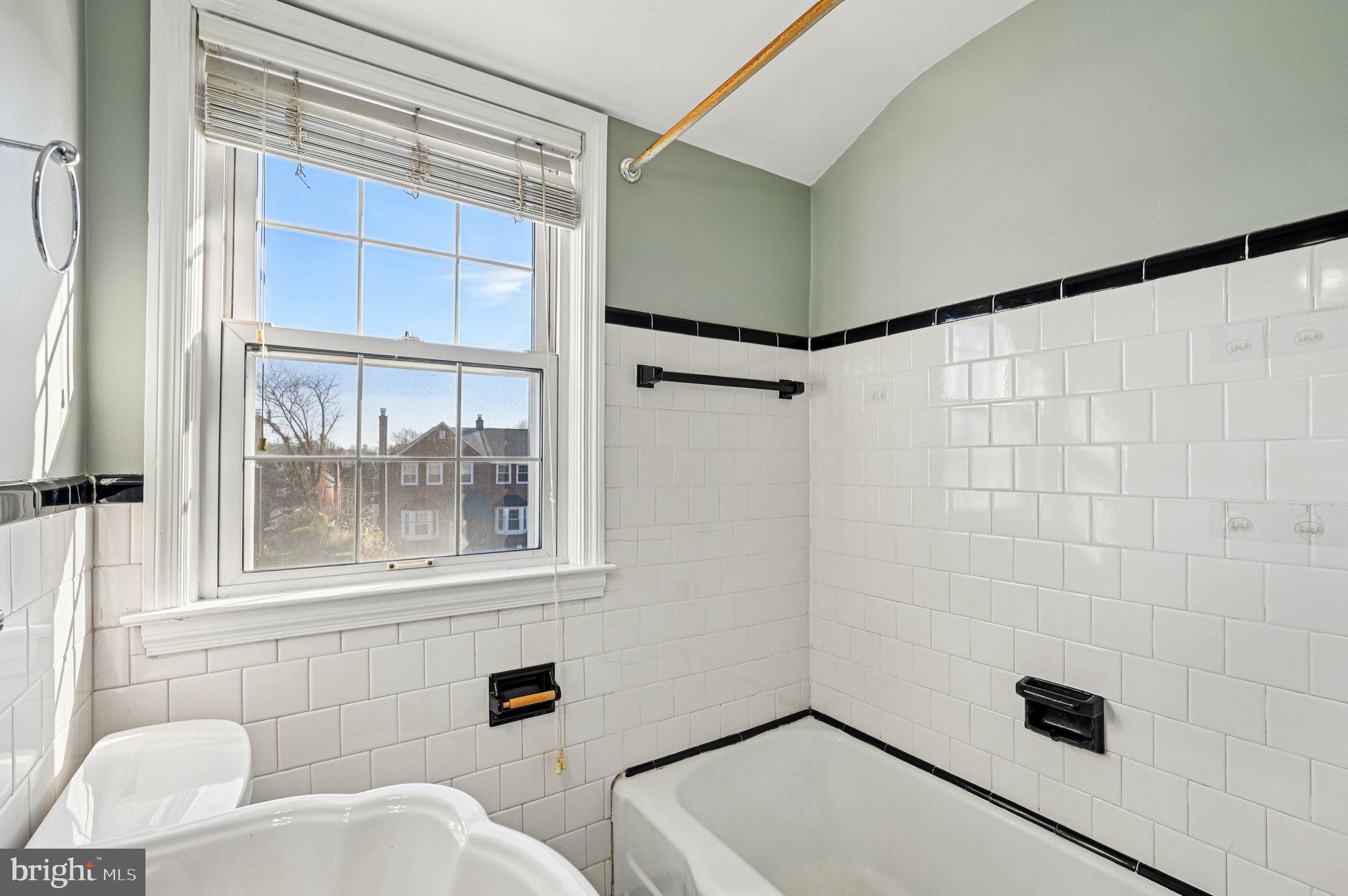 8334 Wyton Road Baltimore, MD 21286 - Photo 25 of 44 a bathroom with a toilet and a shower