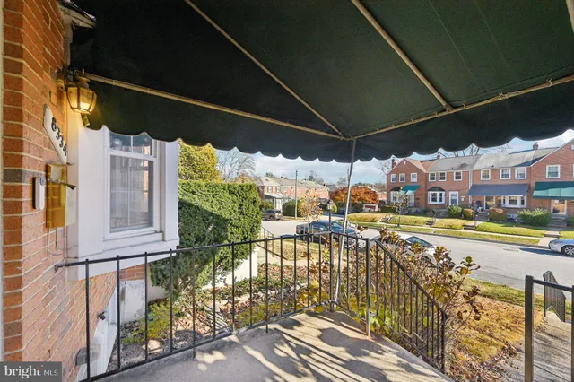 a view of a balcony with ocean view