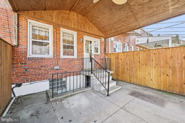a front view of a house with a porch