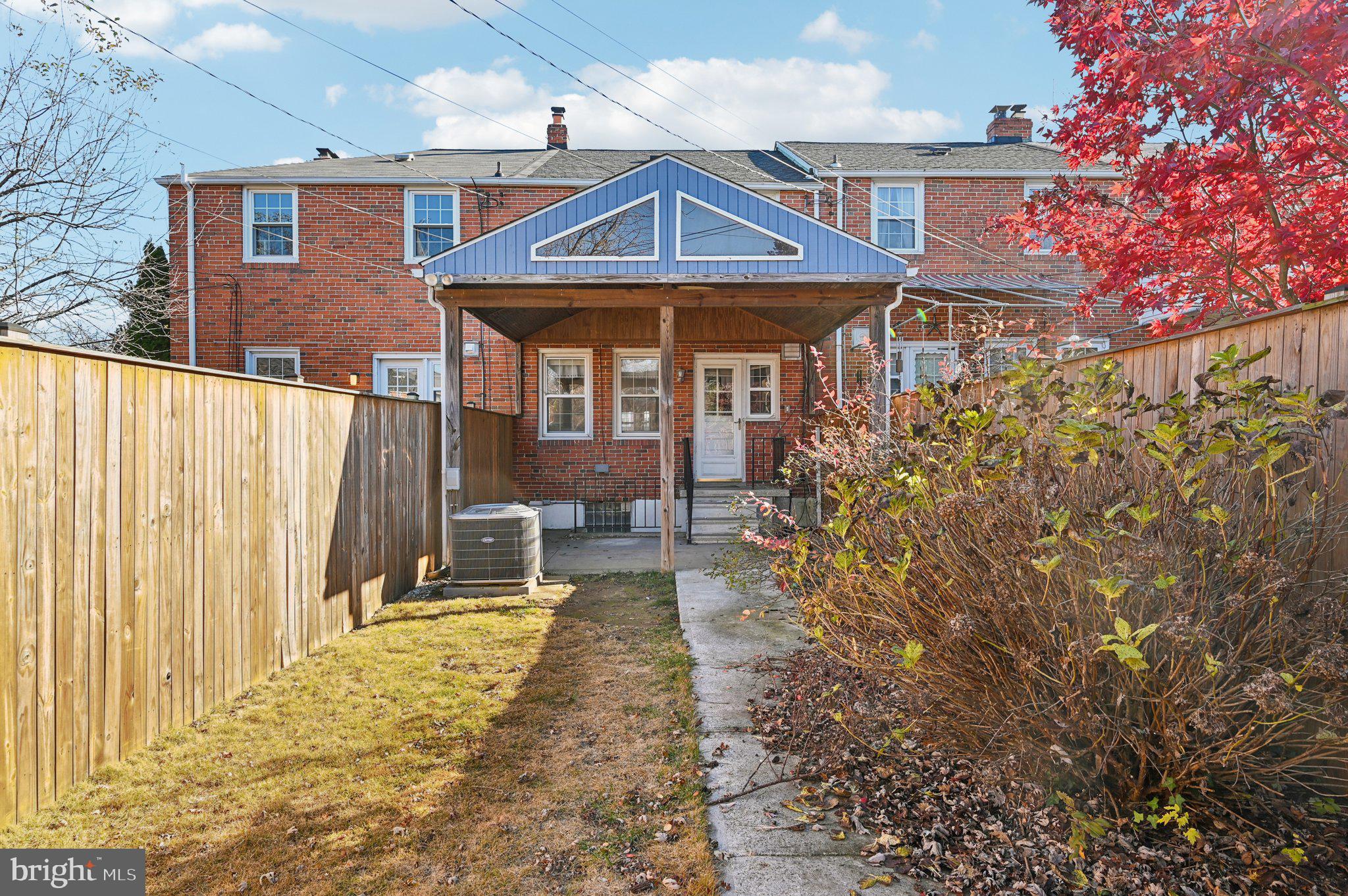 8334 Wyton Road Baltimore, MD 21286 - Photo 41 of 44 a front view of a house with a porch