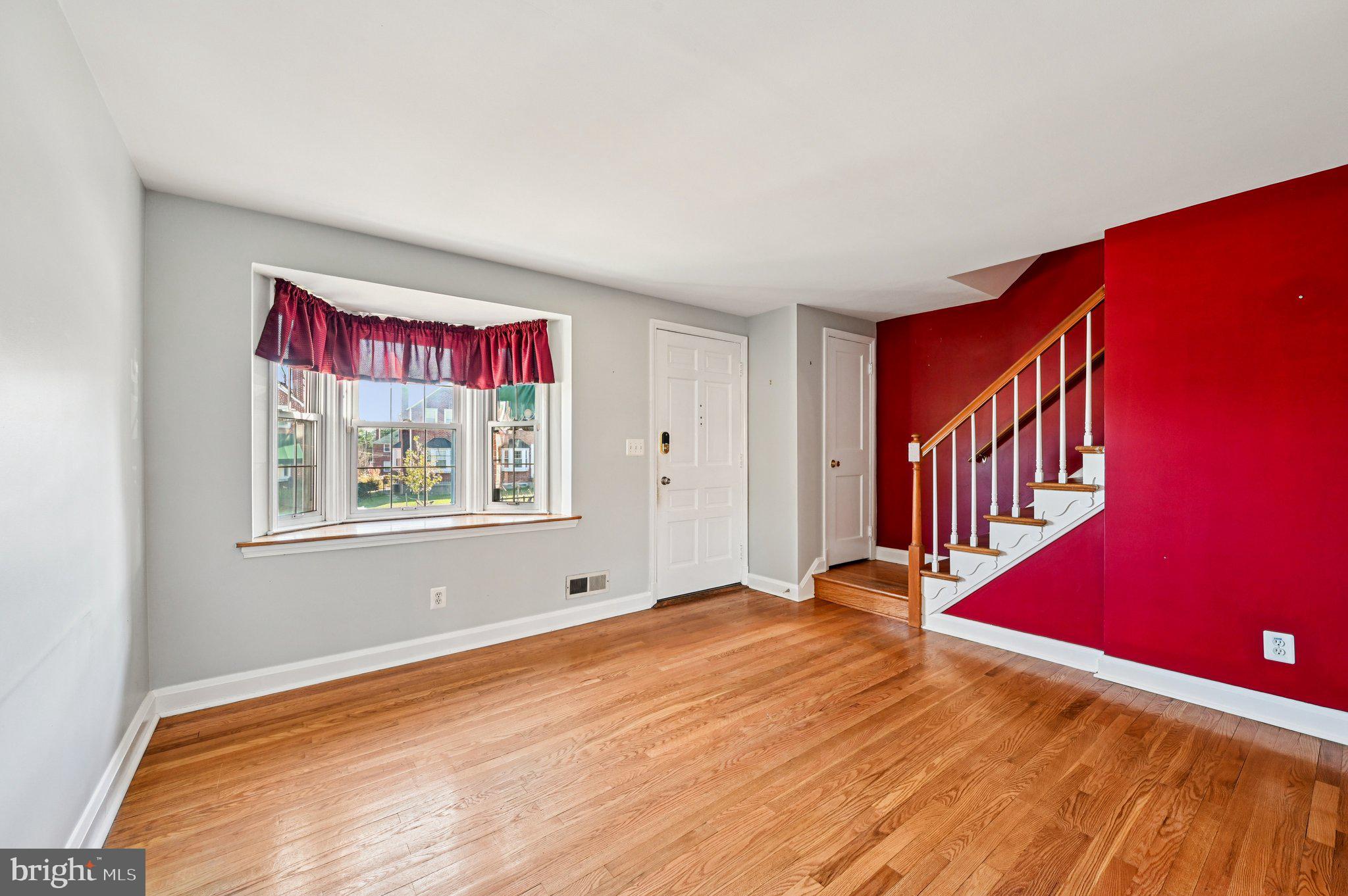 8334 Wyton Road Baltimore, MD 21286 - Photo 7 of 44 a view of an empty room with window