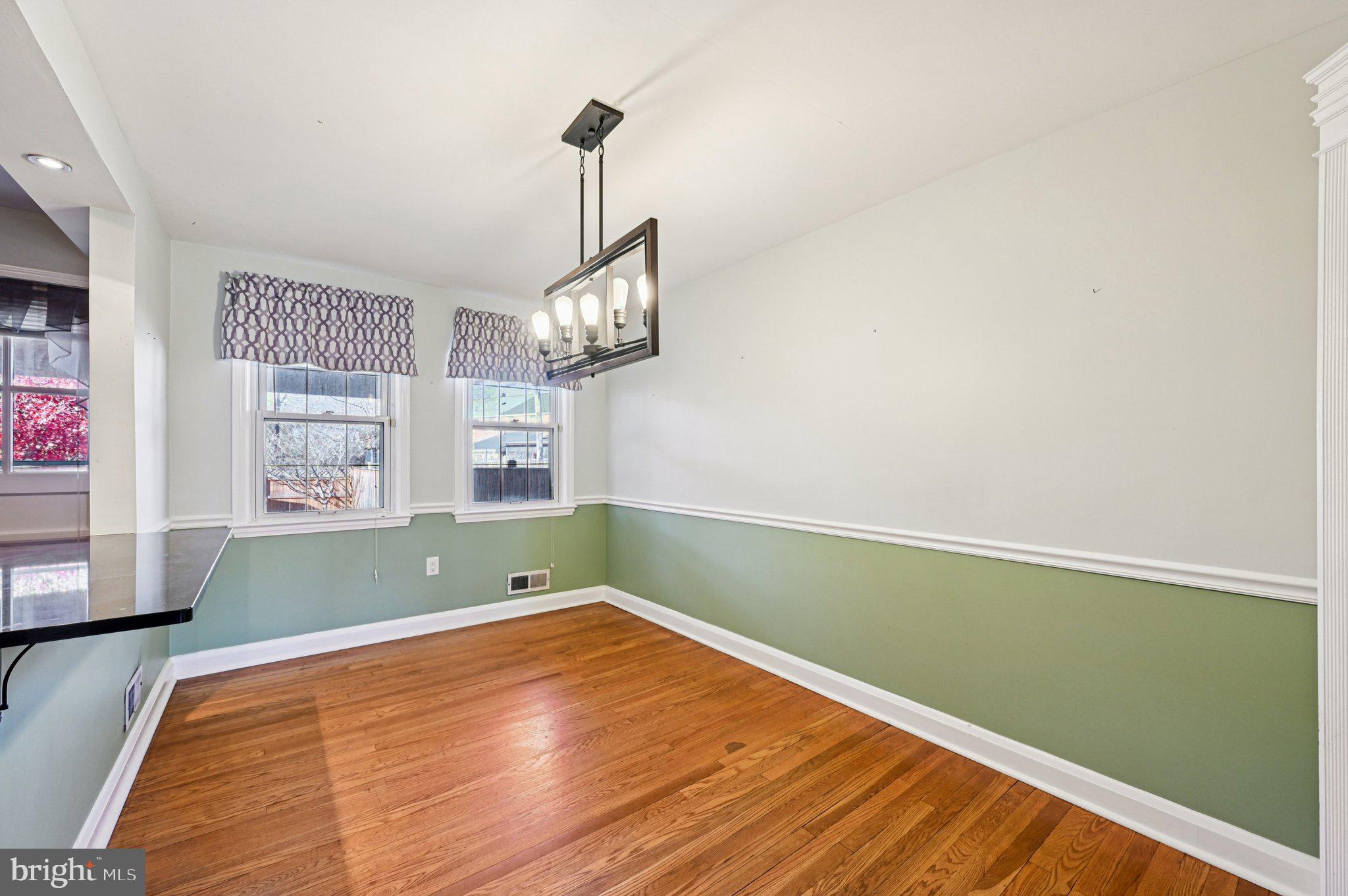 8334 Wyton Road Baltimore, MD 21286 - Photo 9 of 44 a bedroom with a bed and a window