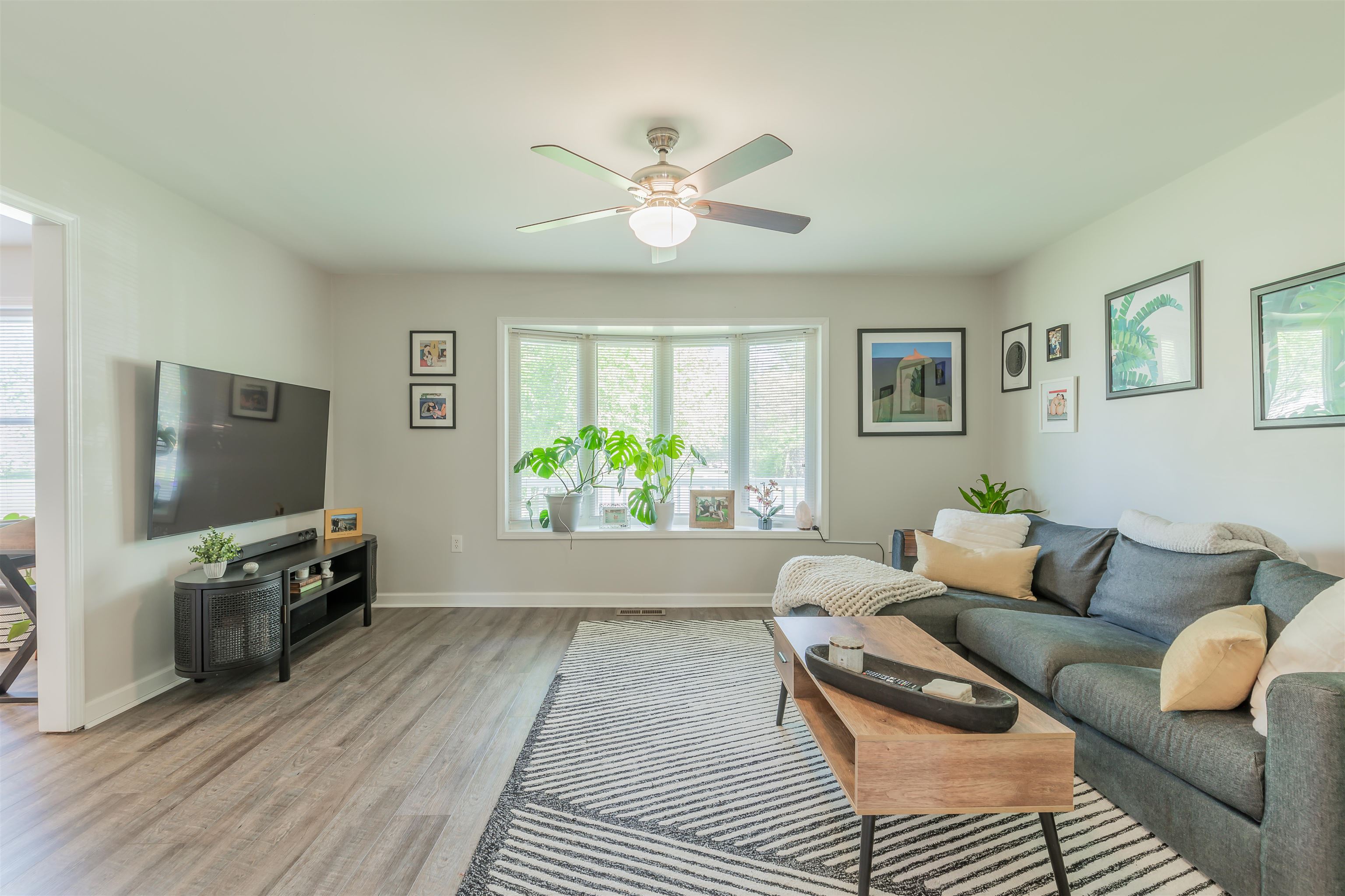 933 Main Street Erma, NJ 08204 - Photo 3 of 24 a living room with furniture and a flat screen tv