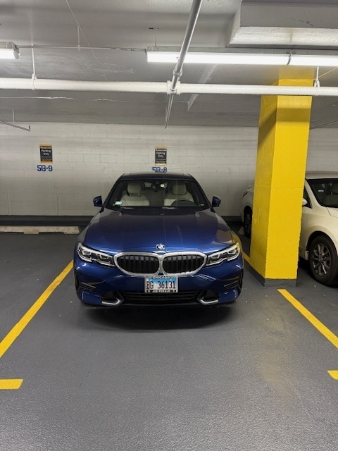 111 East Chestnut Street, Unit P5B8 Chicago, IL 60611 - Photo 2 of 3 a car parked in parking